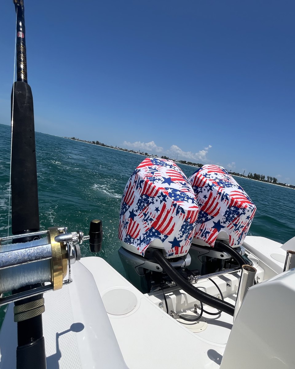 Outer Envy American Patriot vented outboard motor covers fitted on twin outboards running offshore